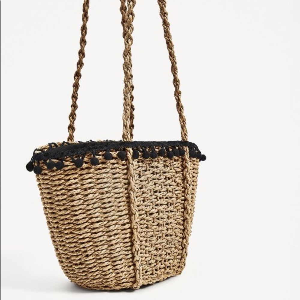 RESTOCKED Straw Woven Basket Bag with Pom Poms - Picture 2 of 6